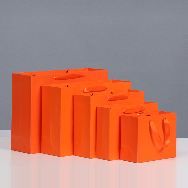 Orange handbag paper bag gift bag clothing shopping bag birthday gift packaging cosmetics lipstick gift bag Orange handbag paper bag gift bag clothing shopping bag birthday gift packaging cosmetics lipstick gift bag