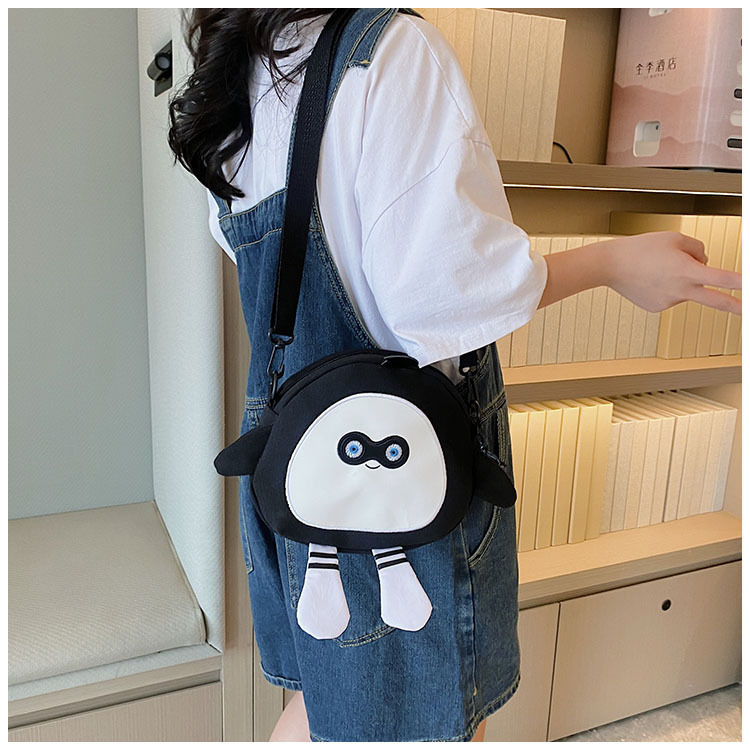 The new 2024 children's egg-shaped party backpack is a cute cartoon canvas single-shoulder bag and a fashionable and stylish small backpack undefined