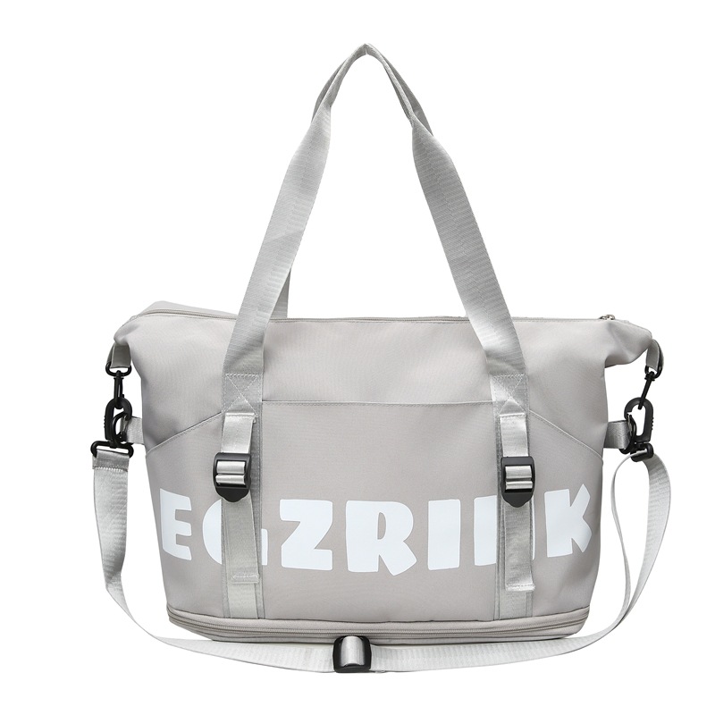 Comercio exterior al por mayor nueva bolsa de viaje de gran capacidad de separación seca y húmeda moda femenina color contraste viaje al aire libre almacenamiento bolsa de equipaje