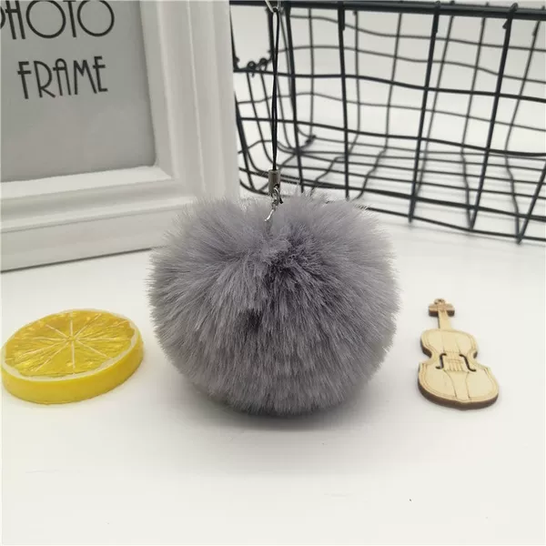 A gray hair ball pendant one