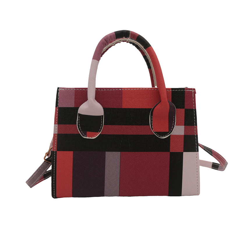 Bolso de diseño de nicho de alto nivel para mujeres 2024 nueva moda versátil bolso de hombro portátil cuadrado pequeño