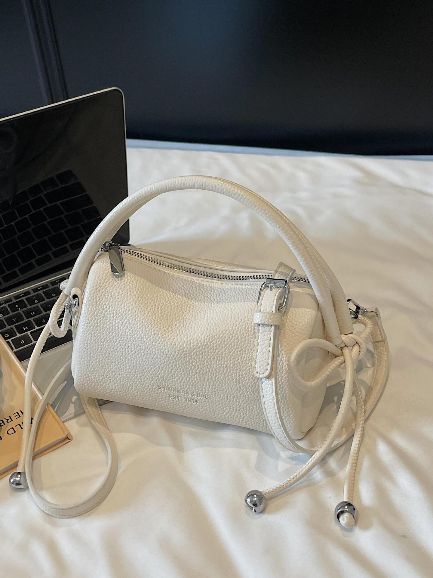 Bolso de mano simple coreano para mujeres 2025, nuevo tipo de bolso de viaje, bolso casual, ligero y de alta calidad.