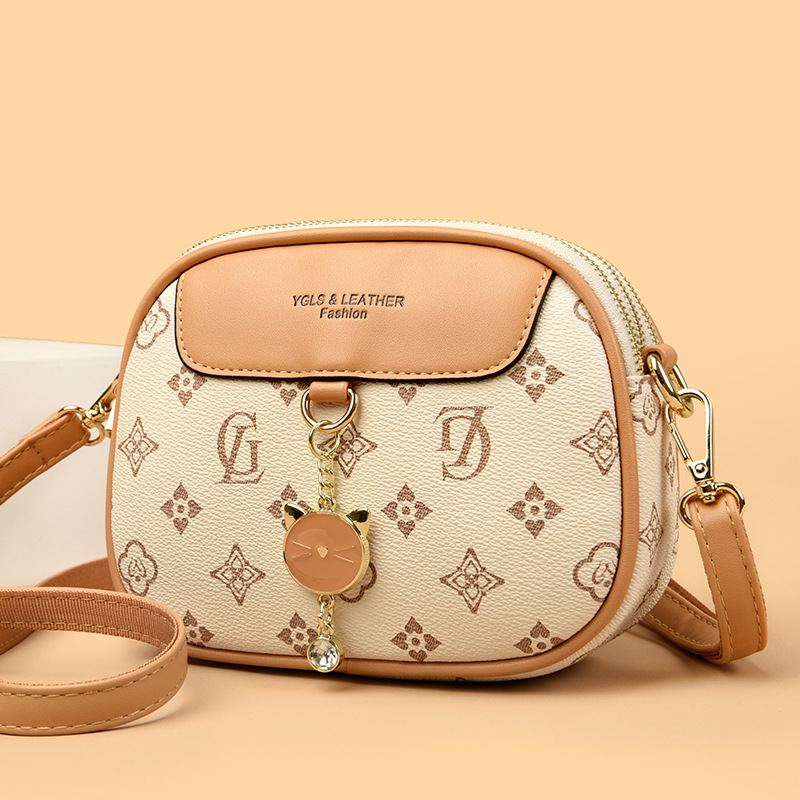 Νέα γυναικεία τσάντα, χιαστί μονό ώμου, μοντέρνο και ευέλικτο, απλό κρεμαστό μενταγιόν, κορεάτικη έκδοση 3411_voghion.com