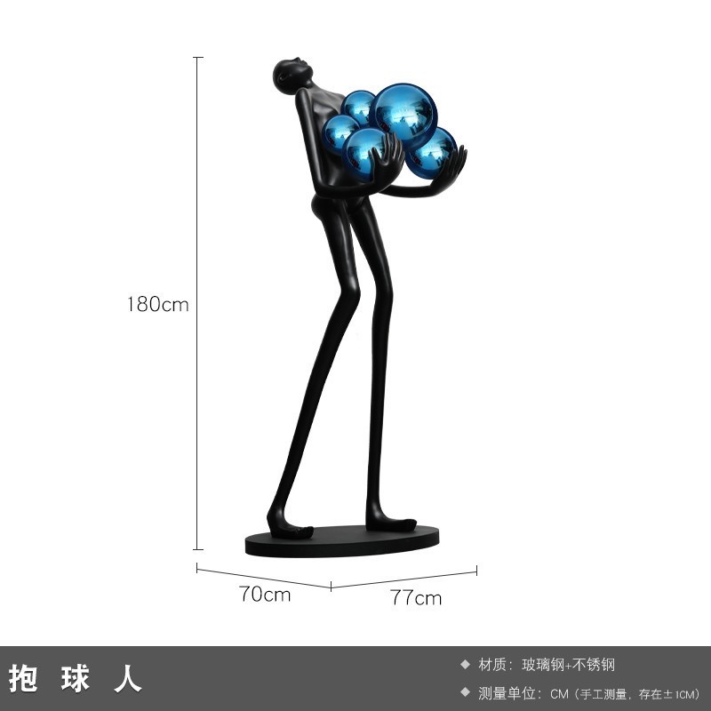 現代の抽象芸術はボールの人物の彫刻を抱きます。|undefined