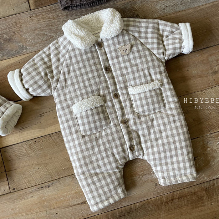 INS estilo coreano bebé niños y niñas de invierno solapa bolsillo de manga larga mono de algodón fino mameluco acolchado forrado de lana larga marea escalada