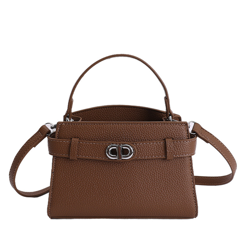 Textura de alta calidad nicho bolso de mano pequeño bolso de mujer nuevo ligeramente lujoso estampado lichi bolso Kylie bolso de mochila de estilo exterior