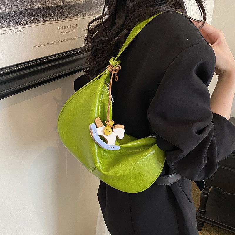 Este año, bolsas de bolinillos populares y simples para mujeres 2026 nuevas texturas diarias de mochila de viaje, bolsas personales de ropa de cama casuales