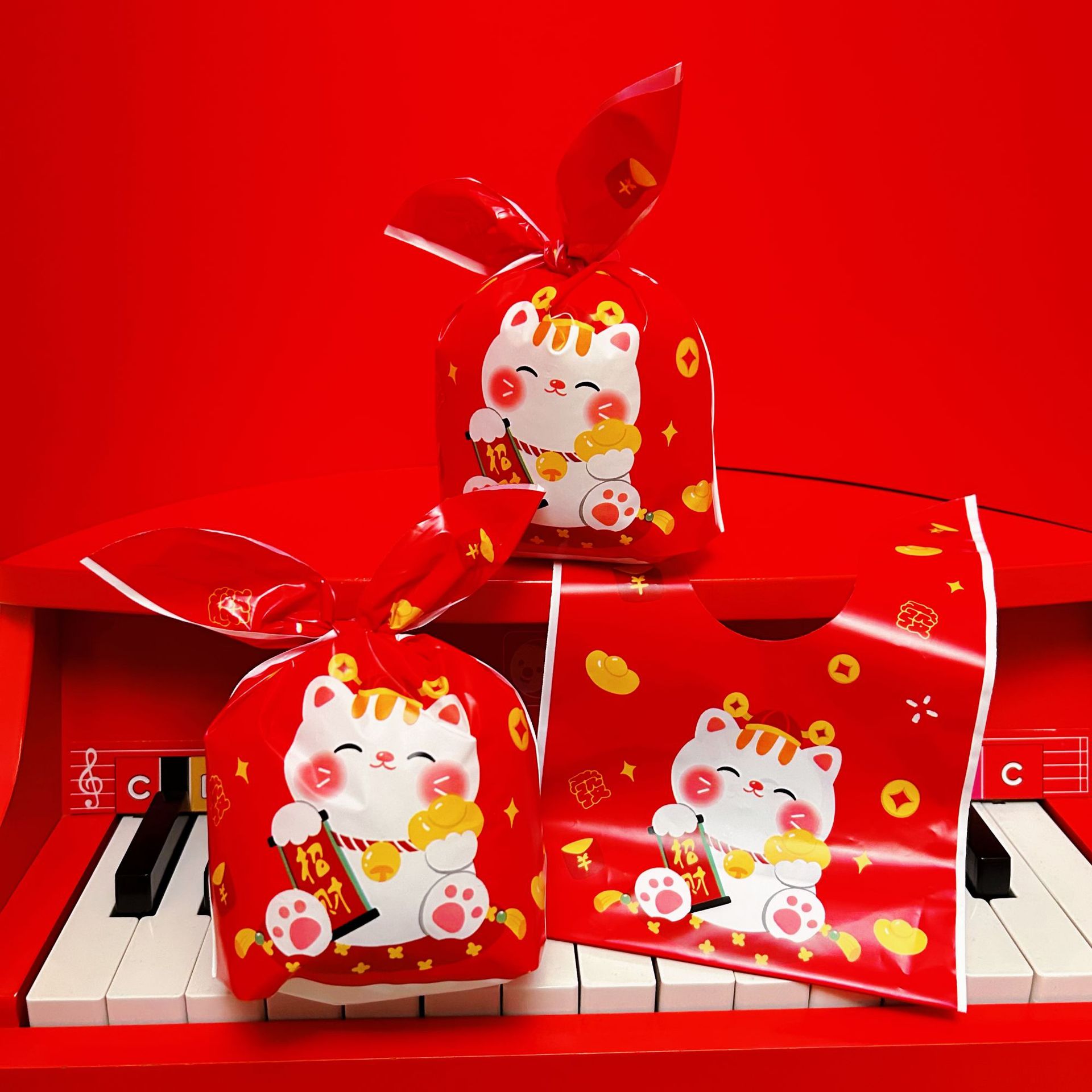 现货新年糖果雪花酥塑料袋喜庆福猫兔耳朵食品礼品包装袋50个一包