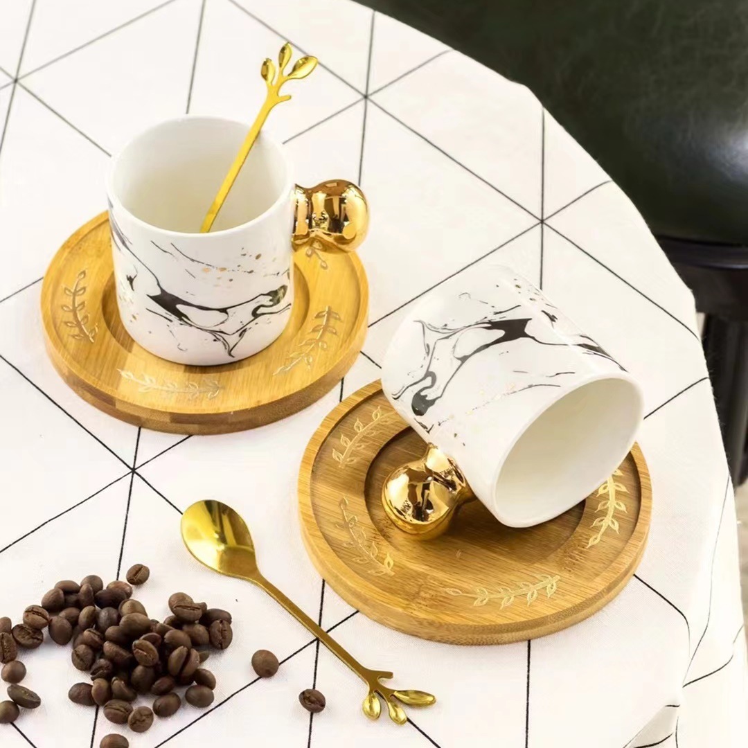 Personalidad creativa marbling regalo Taza de cerámica y platillo taza de oro mango de cerámica nórdica taza de té de la tarde