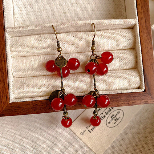 Unique Chinese-style red fruit earrings for women, bohemian hook earrings, long, new Chinese style temperament, high-end, retro earrings.