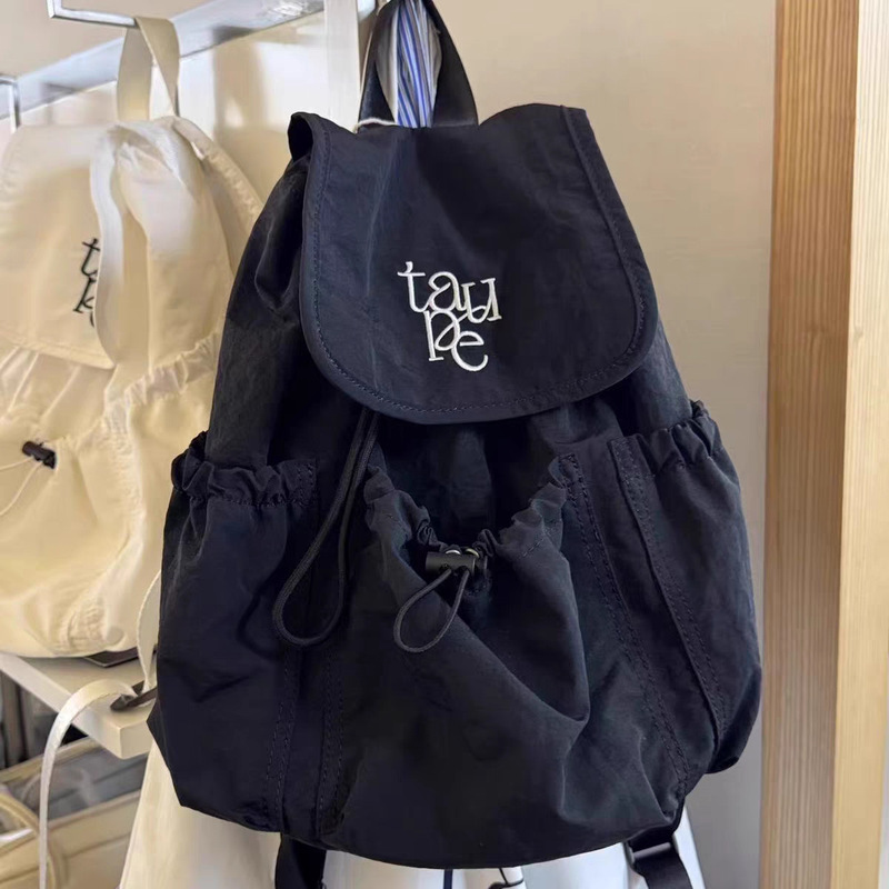 Korean Style Letter New Fashion Street Casual Drawstring Flip Backpack Nylon Canvas Bag Spring and Summer New Style