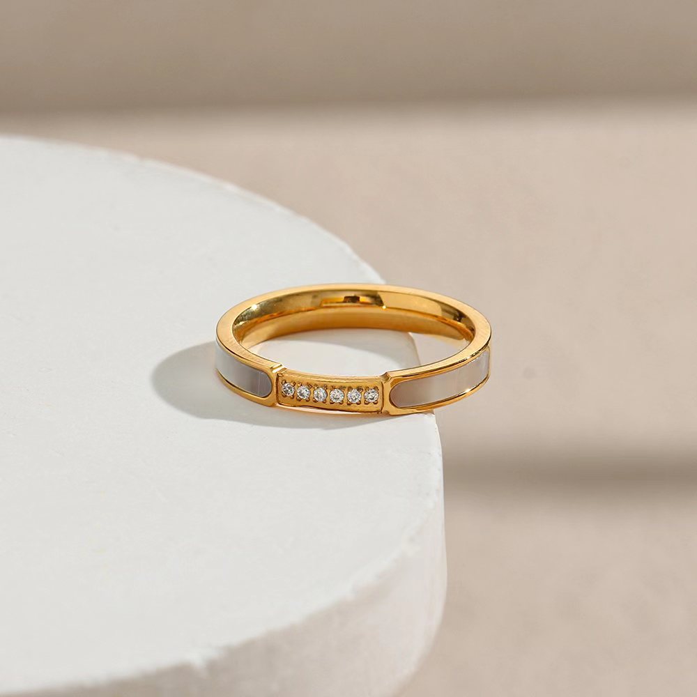 Japanese and Korean titanium steel white mother-of-pearl diamond ring thin circle zircon fashionable temperament versatile niche design internet celebrity ring
