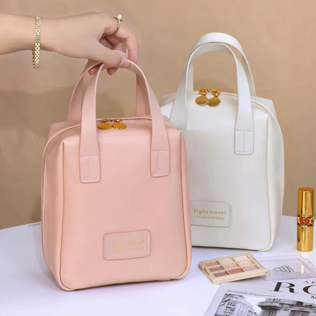 Capacious handheld cosmetic bag for traveling, storage bag