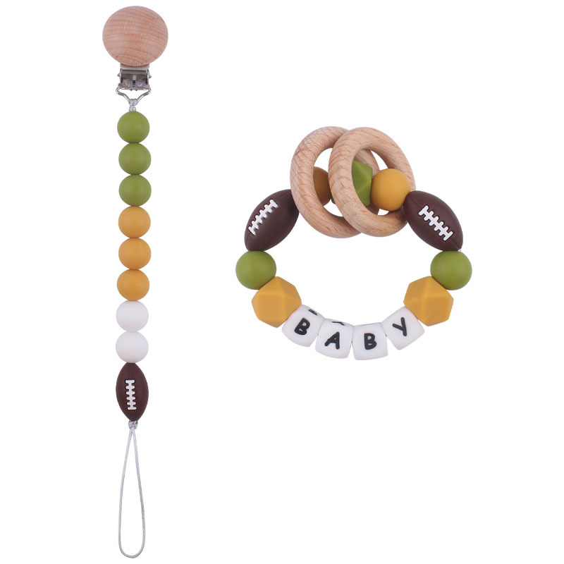 Nuevo bebé suministros de dibujos animados rugby mordedor chupete cadena calmante bebé DIY pulsera mordedor conjunto de dos piezas