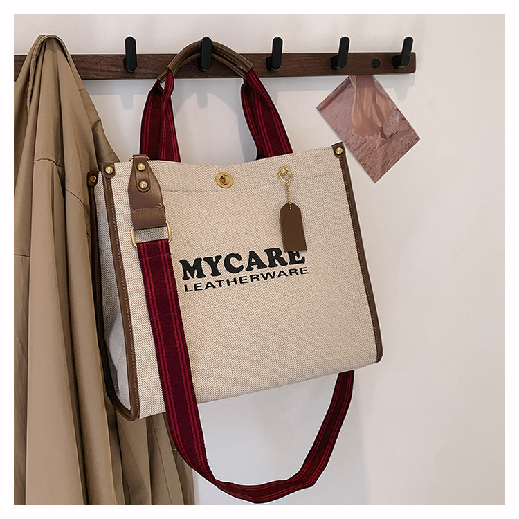 Bolsa de mano de lona de gran capacidad para mujeres 2024 nueva moda impresa letras mochilas bolsa de viaje casual