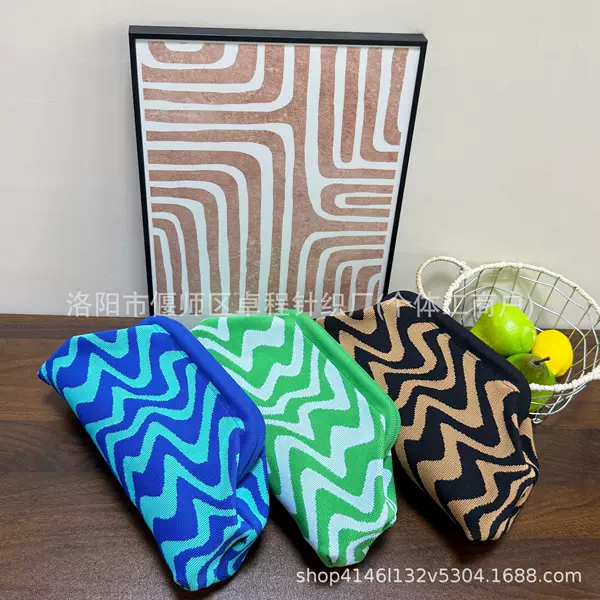 Cross-border ready-to-ship knitted bag, striped bag, women's woven cloud cosmetic bag, versatile and stylish makeup bag with large capacity