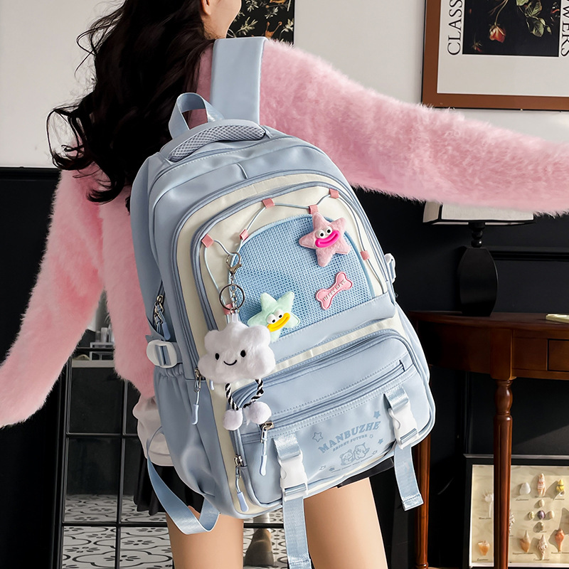 新款中学生卡通书包 大容量可挂拉杆箱耐磨耐脏大学生休闲双肩包