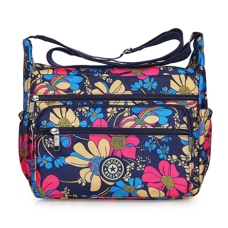 Bolsa de tela de flores bolsa de mensajero de las mujeres nueva bolsa de Madre de gran capacidad bolsa de hombro individual de mediana edad y ancianos bolsa de tela Oxford bolsa