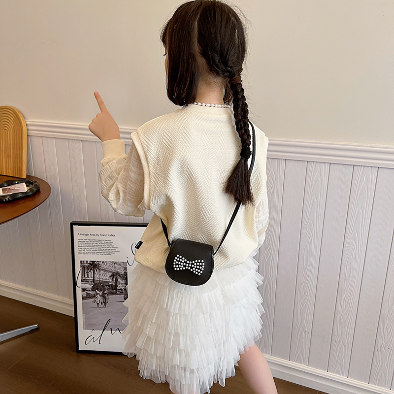 Bolsos de hombro coreanos para niños y niñas, estilo extranjero mini arco de perlas, bolsos de mochila para niños, 2024 nuevos bolsos para niños