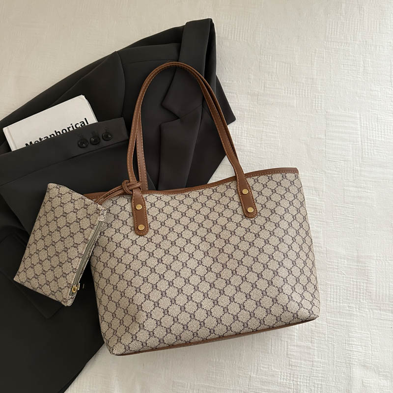 Bolso de alta calidad de gran capacidad 2025 nuevo bolso de viaje de todo fósforo de nicho para mujer bolso de niño de moda para mujer bolso portátil para mujer