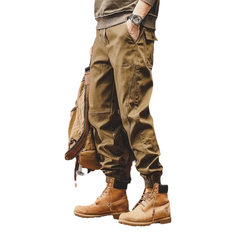 Pantalones casuales para hombres Primavera y otoño Nueva marca de moda coreana suelta más pantalones atados al tobillo pantalones al aire libre con volantes pantalones harén guapos en stock al por mayor