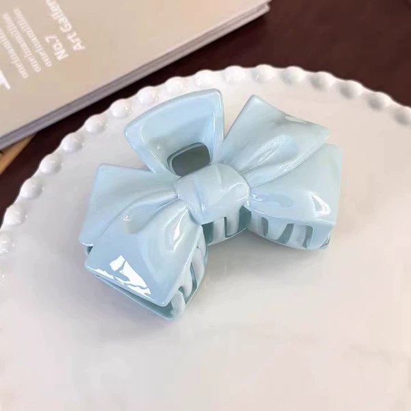 With bow, blue