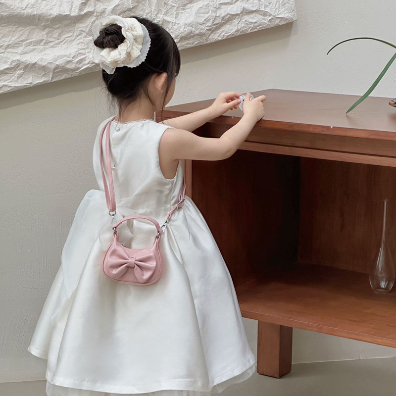 Nuevo comercio exterior bolsos de niños de color sólido bolsos de princesa coreana simple arco mini bolsos de bebé