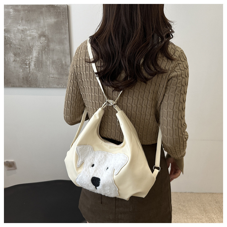 The new autumn and winter 2024 fashion cartoon backpack with simple, individual and niche design, single-shoulder bag and commuter tote bag undefined