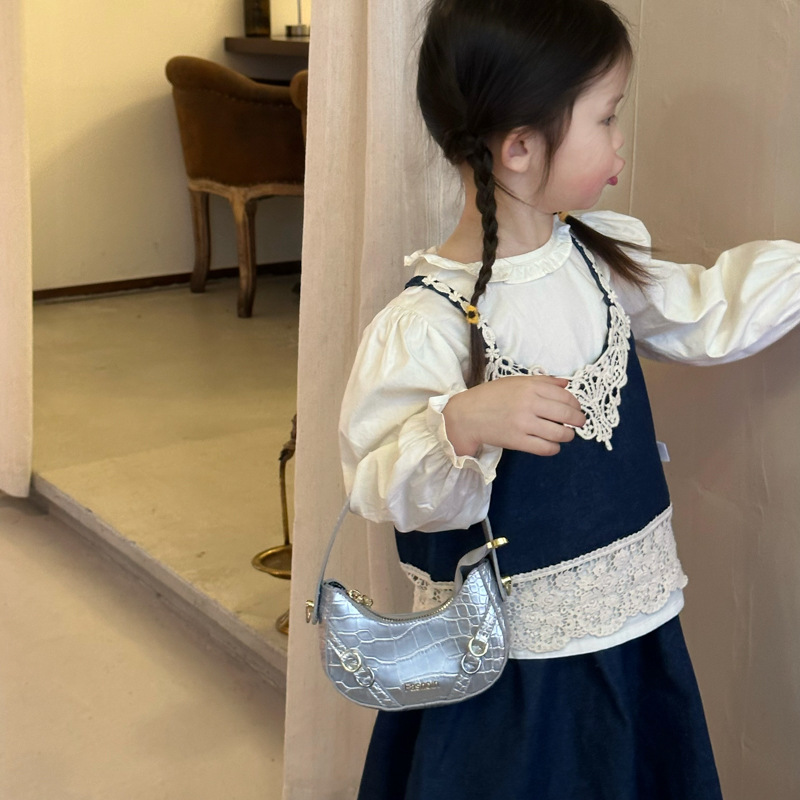 Bolso para niños coreano piedra simple bolso de hombro para bebés de color sólido 2025 nuevo bolso para niñas debajo de la axila