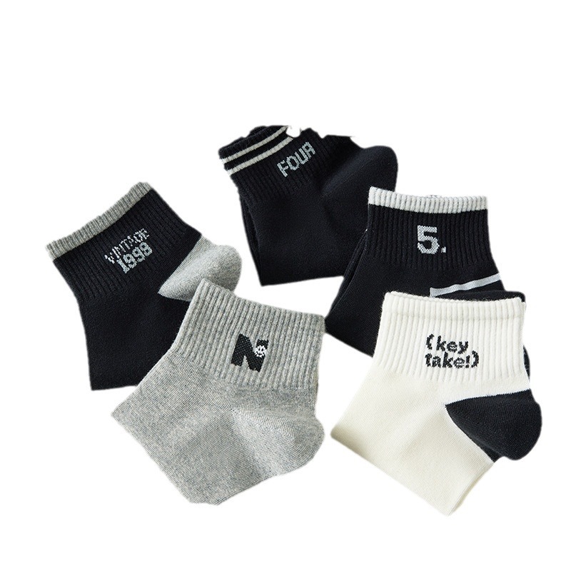 Blanco y negro sólido nuevo estilo versátil calcetines de mujer calcetines al por mayor Zhuhai Fuente de la industria de calcetines de moda de mujer calcetines antiodorantes