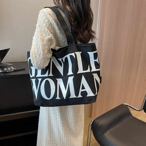 大容量字母帆布托特女包新款都市简约单肩包文艺上课学生布袋