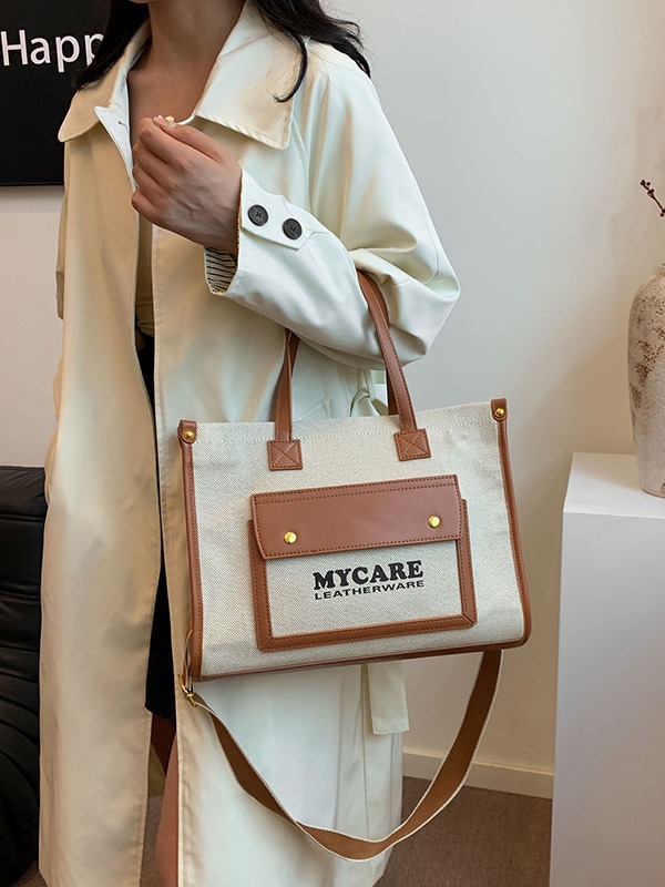 Bolso de hombro retro de tela con colores contrastantes para mujer, nuevo bolso cruzado de gran capacidad para el día a día, ideal para comercio transfronterizo.