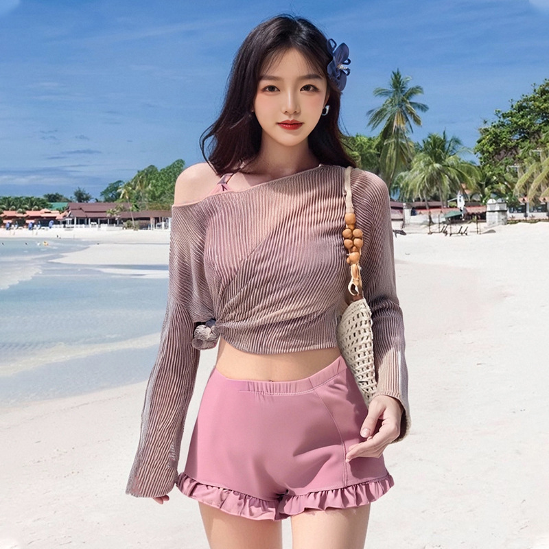 Traje de baño femenino venta caliente versión coreana de moda dividida de tres piezas que cubre la carne, delgado y conservador traje de baño de vacaciones de aguas termales para estudiantes de manga larga