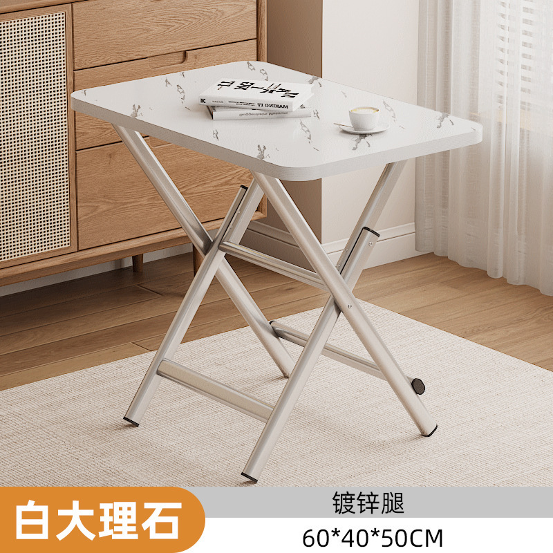 折りたたみテーブルとテーブルの四角いテーブルと家庭用の簡易食事テーブルと屋外には折りたたみテーブルと椅子の小型タイプの賃貸住宅があります。|undefined
