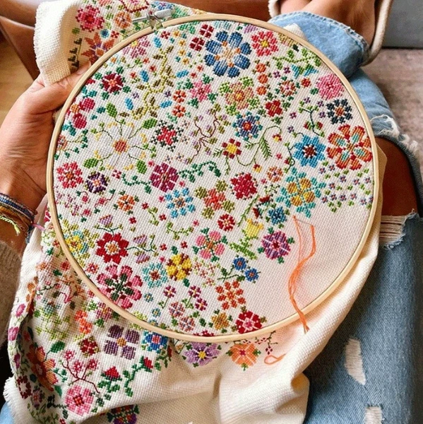 With embroidery