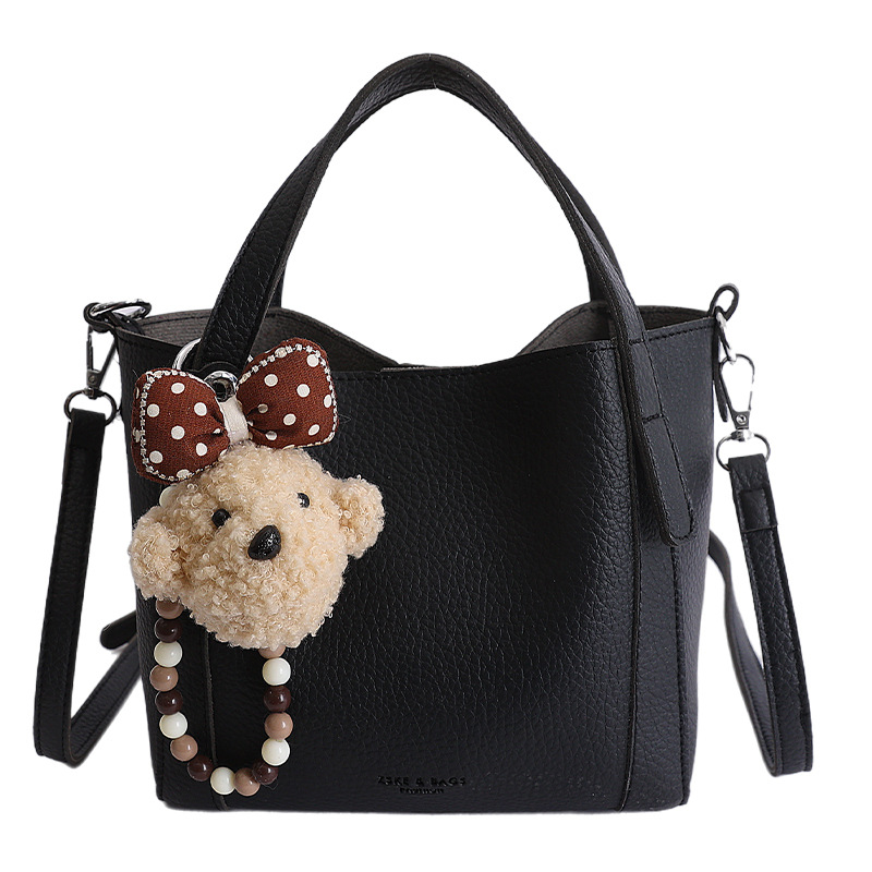 Nicho coreano litchi pattern bolso de cubo de mano mujer comercio exterior nueva moda alta textura ligera lujosa bolsa de mochila