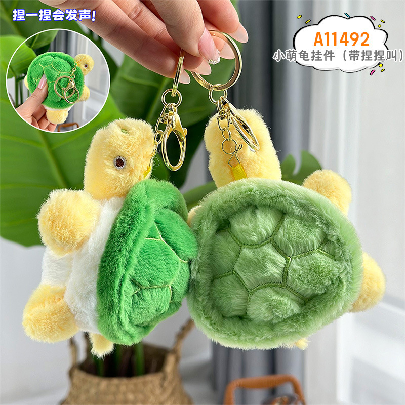 Nuevo gato garra chirriante colgante tortuga juguete de peluche muñeca de dibujos animados juegos pequeños regalos al por mayor