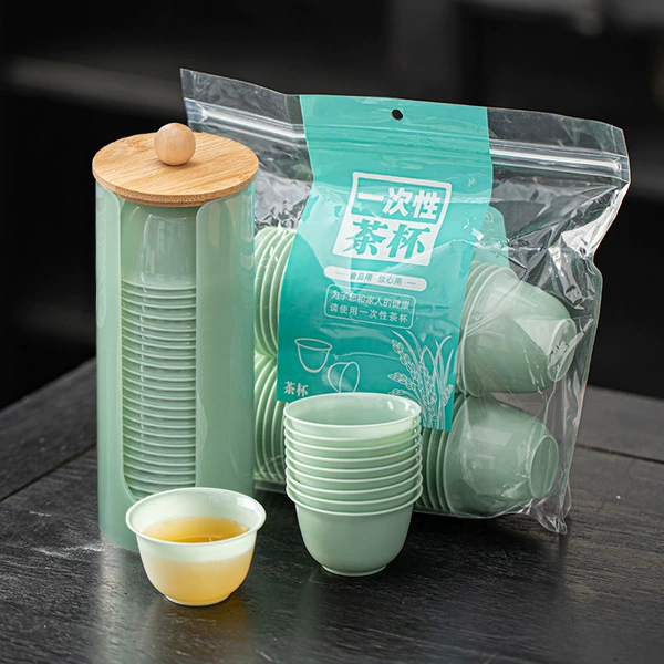 Emerald green disposable tea cup, glass holder
