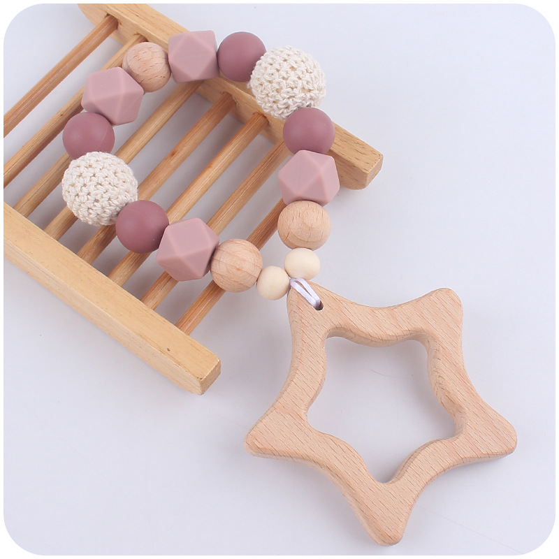 Nuevo bebé de dibujos animados Beech Star teether DIY calmante bebé mordedura de pegamento molar pulsera juguete