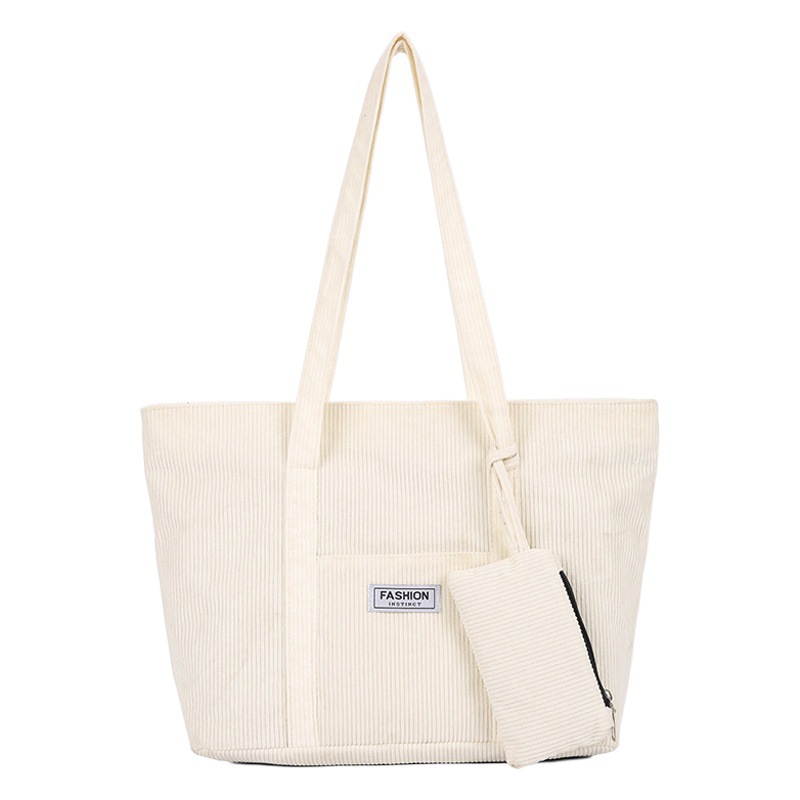 2025 otoño e invierno nueva moda bolso de hombro de pana de gran capacidad bolso de mano fresco estilo japonés bolso grande de pana de color puro para mujer