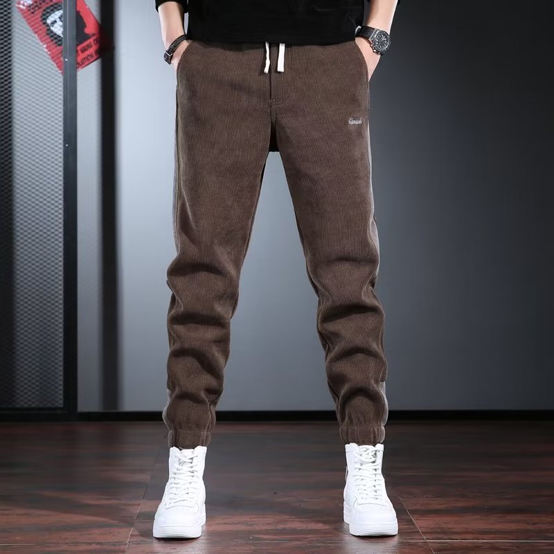 Jeans de marca de moda para hombres, pantalones harem casuales negros de primavera y otoño para hombres, cintura elástica, pantalones gordos sueltos de hip-hop