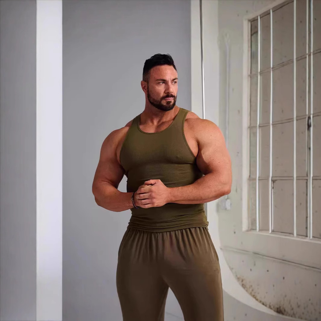 Chaleco de hombre verano americano delgado deportivo chaleco de color sólido fitness tendencia de los hombres casual elástico sin mangas camiseta