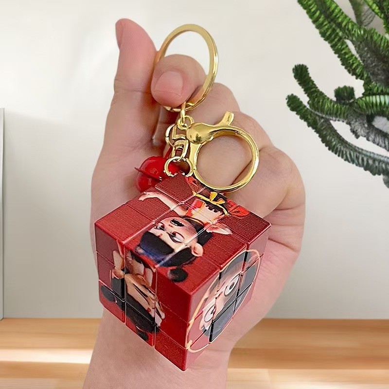 Nezha's Devil Boy Naohai Patrón de dibujos animados creativos Cubo de Rubik Llavero Bolsa Colgante Llavero Regalo pequeño al por mayor