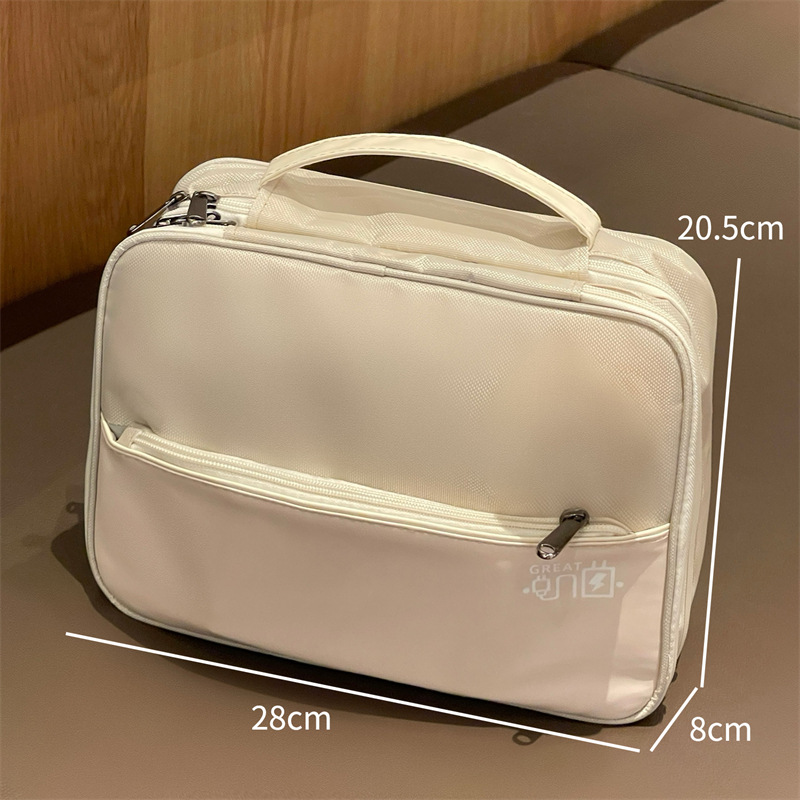 Nueva bolsa de maquillaje de gran capacidad multifuncional para salir bolsa de lavado portátil de alto valor facial bolsa de almacenamiento de maquillaje impermeable de tres capas