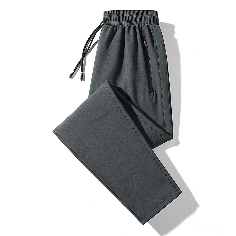 2024 pantalones gruesos de terciopelo para hombres pantalones deportivos casuales moda todo fósforo otoño e invierno pantalones deportivos delgados al por mayor