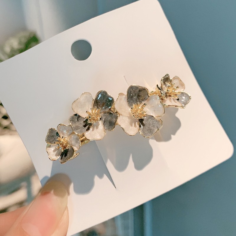 Aceite que gotea flor clip de primavera tocado Cabeza trasera femenina clip superior transfronterizo de alta gama temperamento francés Luz de lujo diseño horquilla