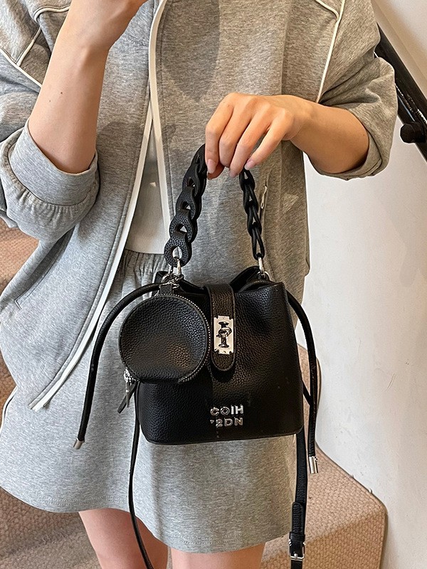 Bolso de mujer 2025 nuevo bolso de mensajero de hombro con patrón de lichi de alta calidad bolso de cubo portátil de moda casual de todo fósforo