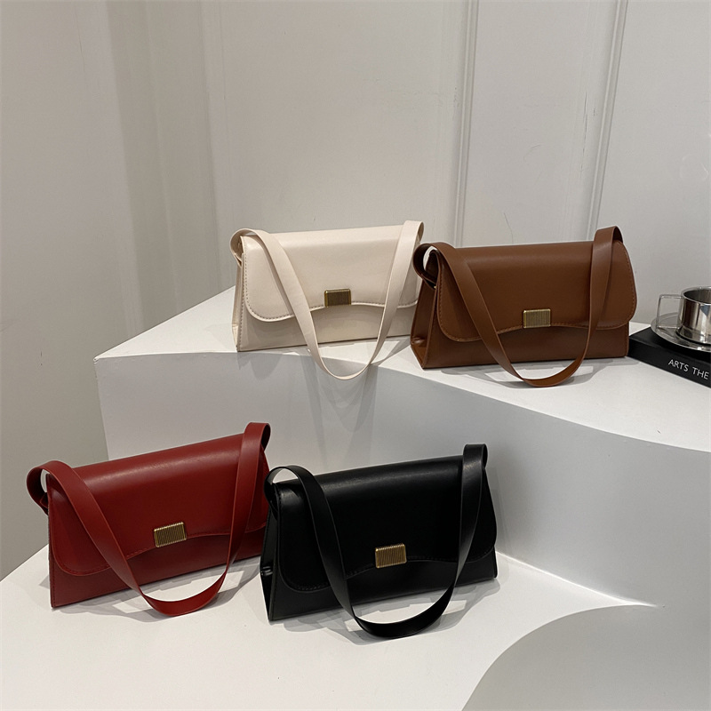 Bolsos pequeños retro para mujer 2025 nuevo estilo moda moda moda moda bolsa de mensajero hombro bolsa de axila simple bolsa cuadrada pequeña marea