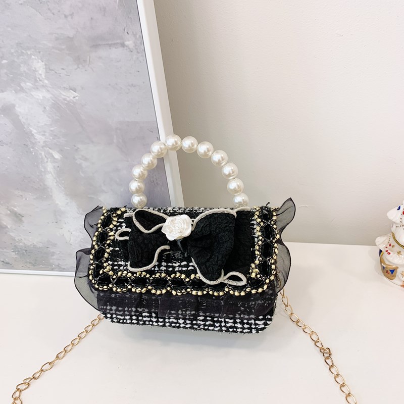 Bolso infantil, lindos arcos de perlas, bolso de mochila para niños, estilo coreano de moda, bolso de hombro para hombres y mujeres.