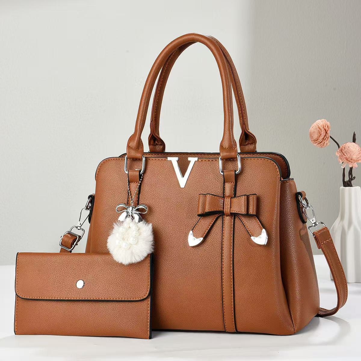 Bolsos grandes de marca de lujo ligero, bolsos de mujer, 2025 nuevo bolso de hombro de moda, sentido de alta gama, gran capacidad
